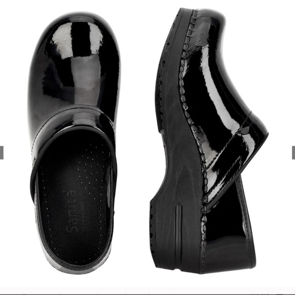 sanita black patent clogs